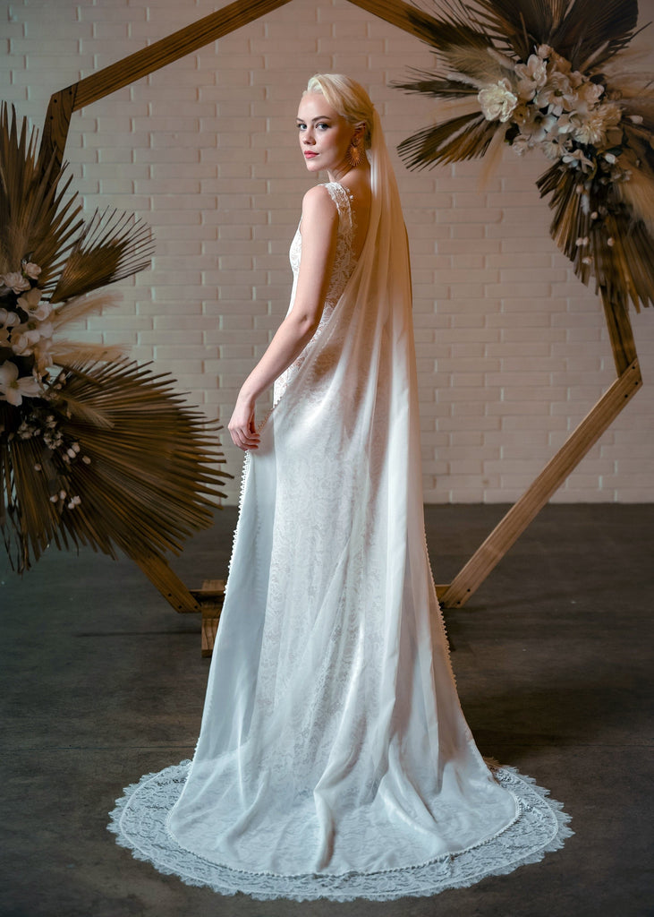 Bride wearing Shay veil and Carri dress, from behind