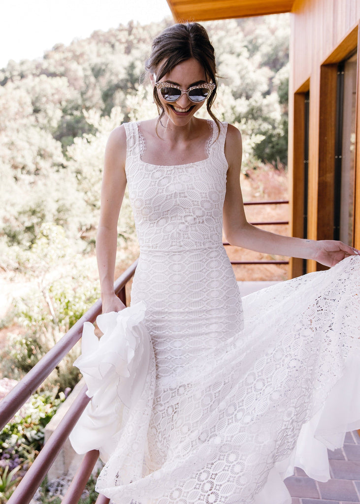 Bride in Elle Dress wearing sunglasses and smiling