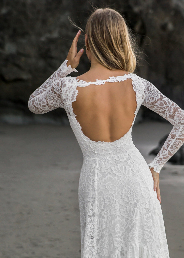 Back view of bride wearing Indigo Dress on beach