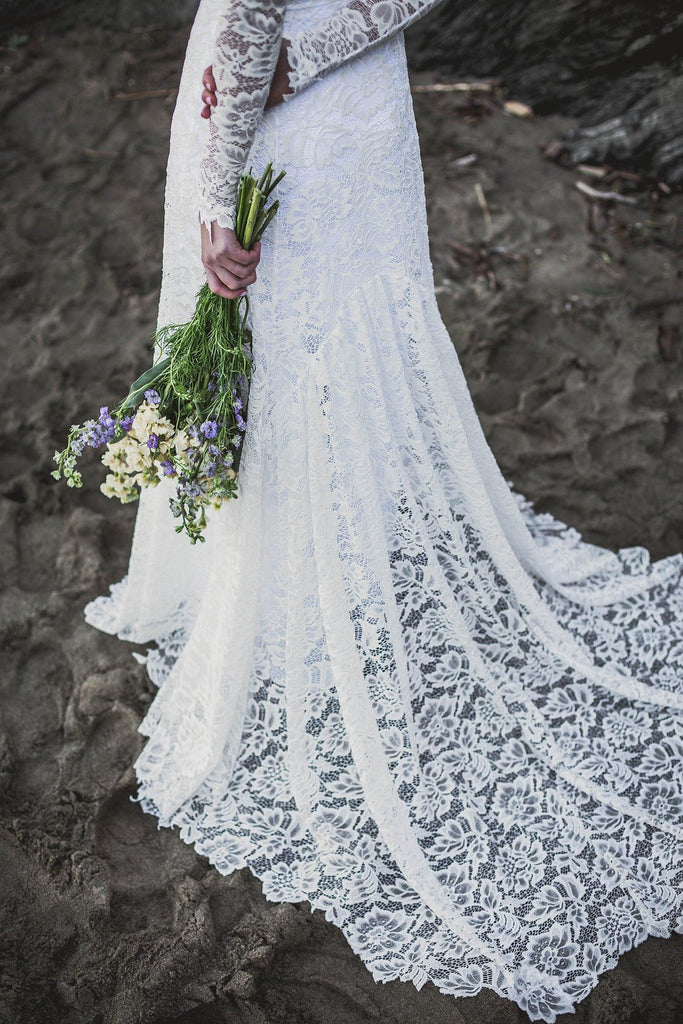 Bride wearing Indigo Dress, closeup of train lace