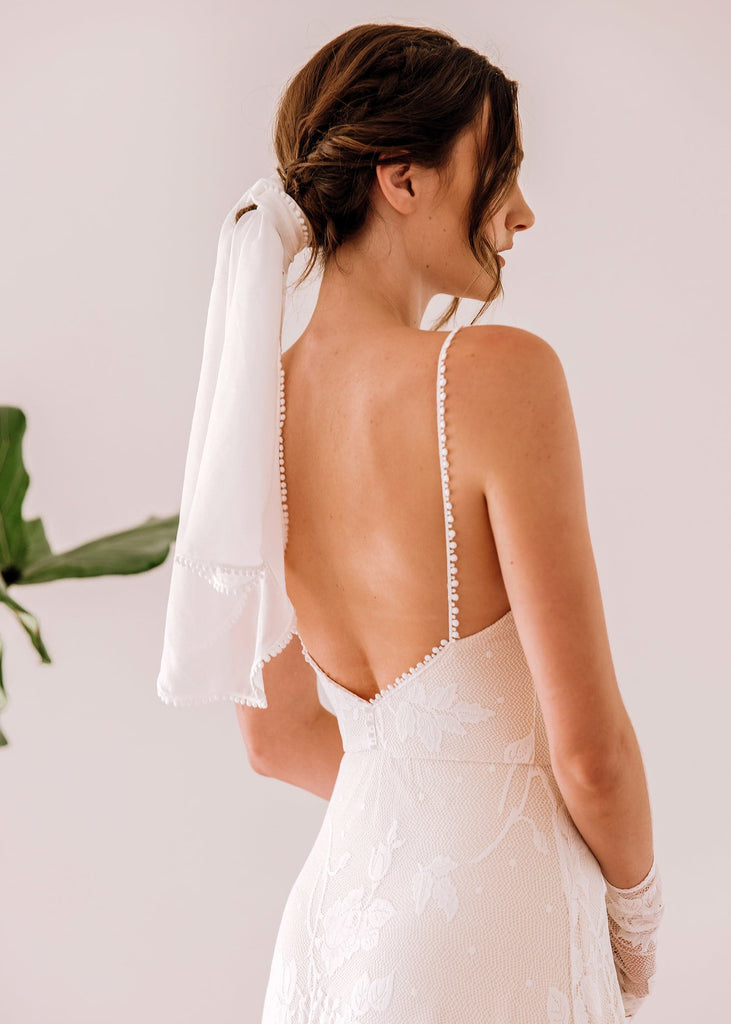 Back of bride wearing Lilith Dress